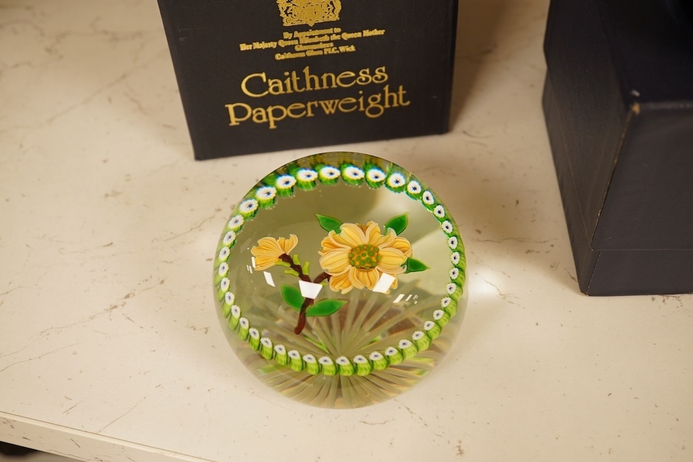 Four Caithness boxed paperweights to include ‘Garland’ and boxed Langham paperweight